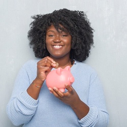 Woman with piggy bank in Phoenix